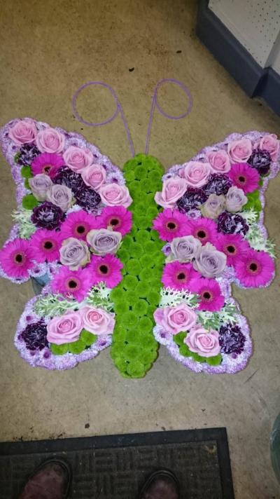 Butterfly - At Flower Power we are delighted to offer this butterfly funeral tribute in your choice of colour.