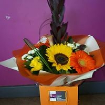 Sunshine Bouquet - A delightful selection of carefully selected bright, vibrant colours, of orange and yellows, including sunflowers and gerbera in an hand tied bouquet.

Delivered in a presentation gift bag and water for an instant display.

Available to order for collection or local delivery  or in Oswaldtwistle, Accrington, Clayton Le Moors, Rishton, Blackburn, Guide, Belthorn, Shadsworth, Great Harwood, Baxenden and the surrounding areas.