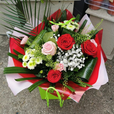 Sweet Romance - A bouquet of mixed beautiful roses is sure to create a lasting impression.