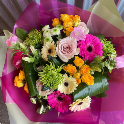 Mamma Mia - Make their day with this bright and vibrant collection of flowers, beautifully presented in a gift box / bag.